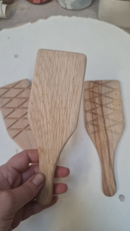 Double sided wooden paddle