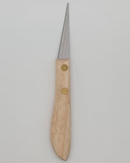 Wooden handled pottery knife