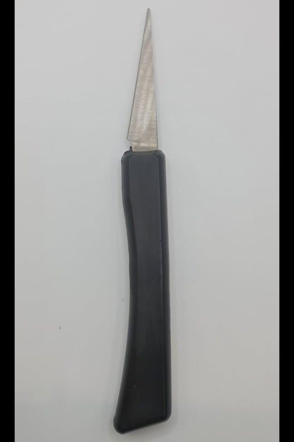 Pottery knife with black handle