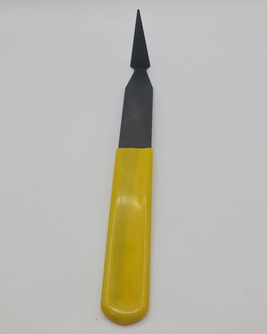 Yellow handled triangle turning tool for the pottery wheel.
